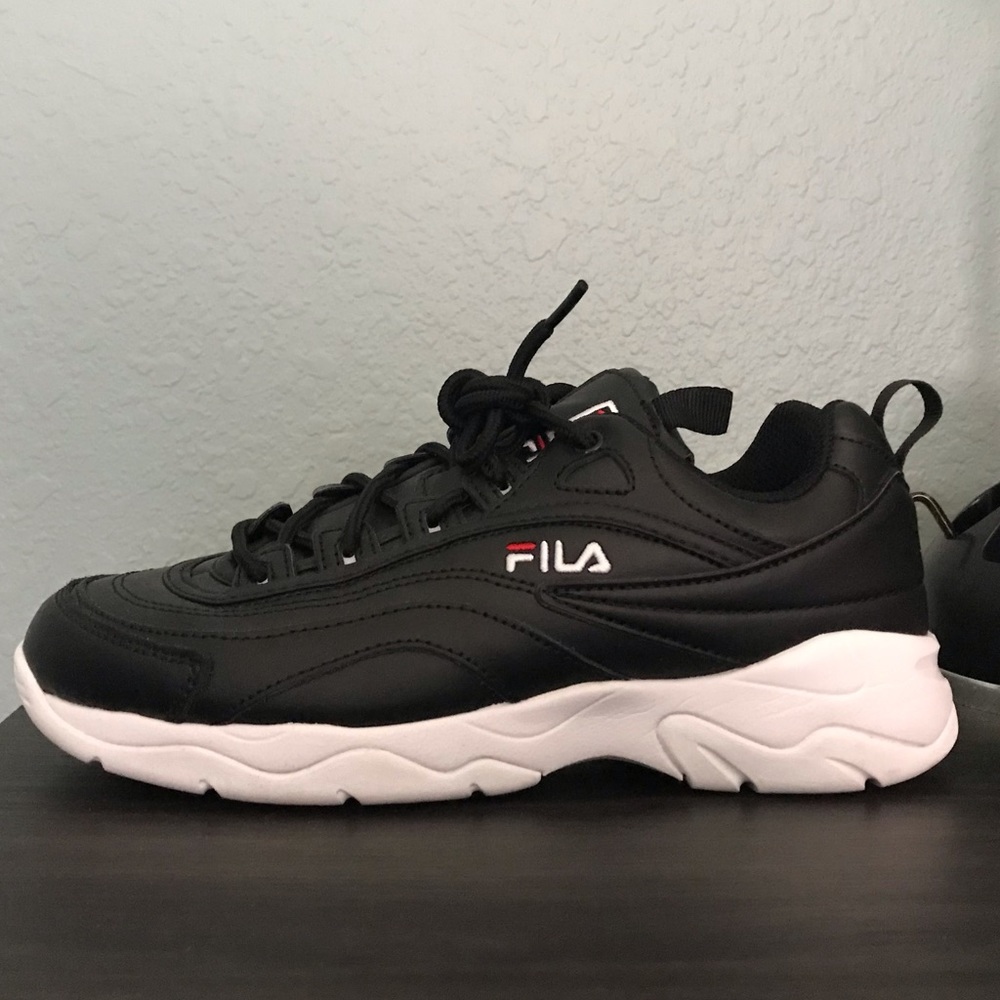 Black fila shoes.